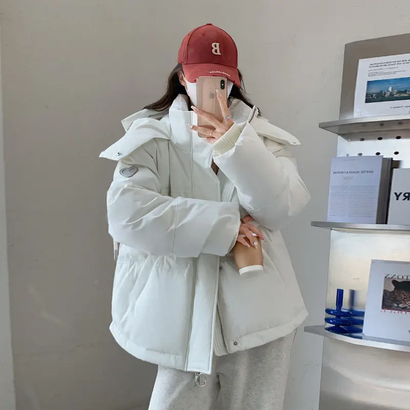 Damen Oversize Steppjacke mit Kapuze | Thermowattierte Winterjacke mit wasserabweisender Oberfläche und Reißverschlusstaschen