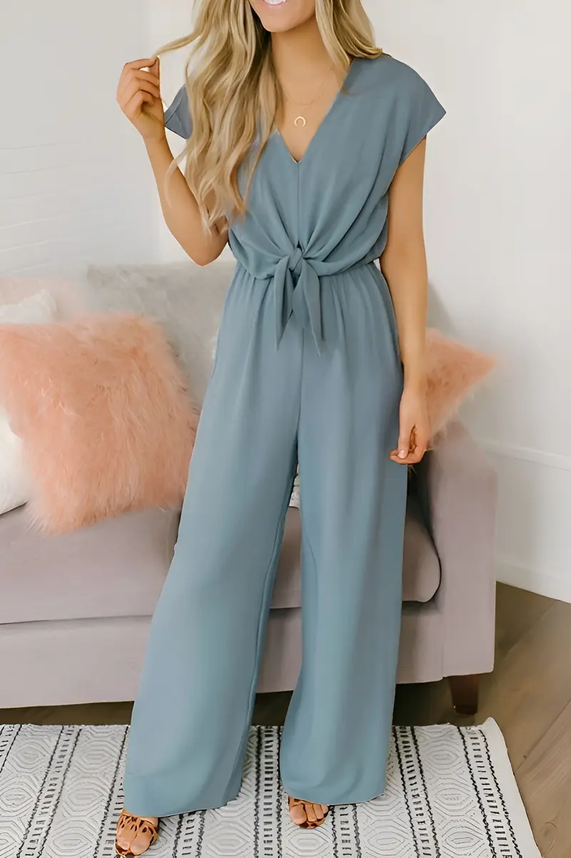 Rückenfreier Damen-Jumpsuit mit tiefem V-Ausschnitt | Lockeres Bein & dezente Taschen | Minimalistisch elegant | S–XL